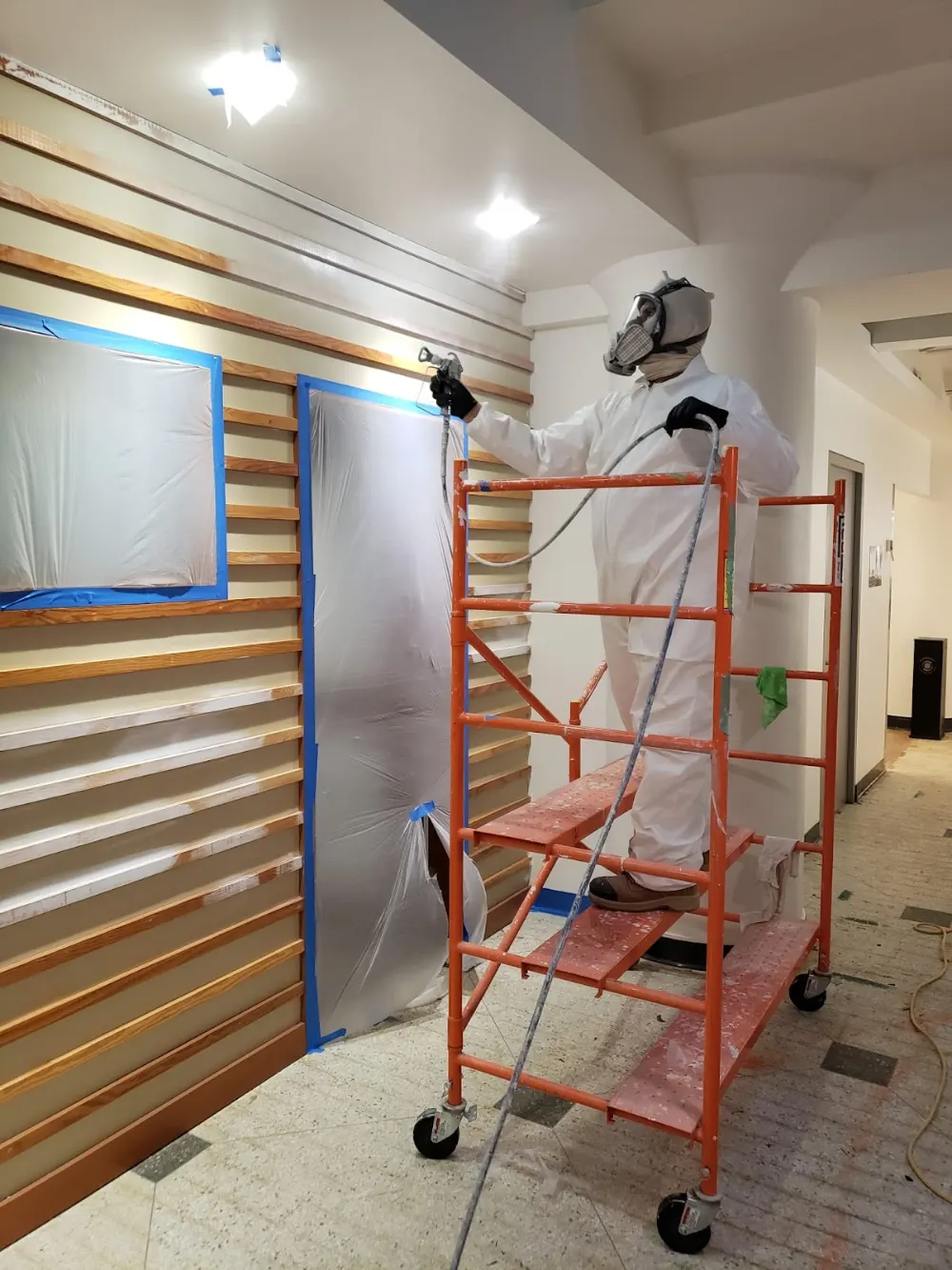 Scaffold set up for a commercial feature-wall painting project